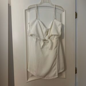 White Sleeveless Romper with Pom-Pom Trim